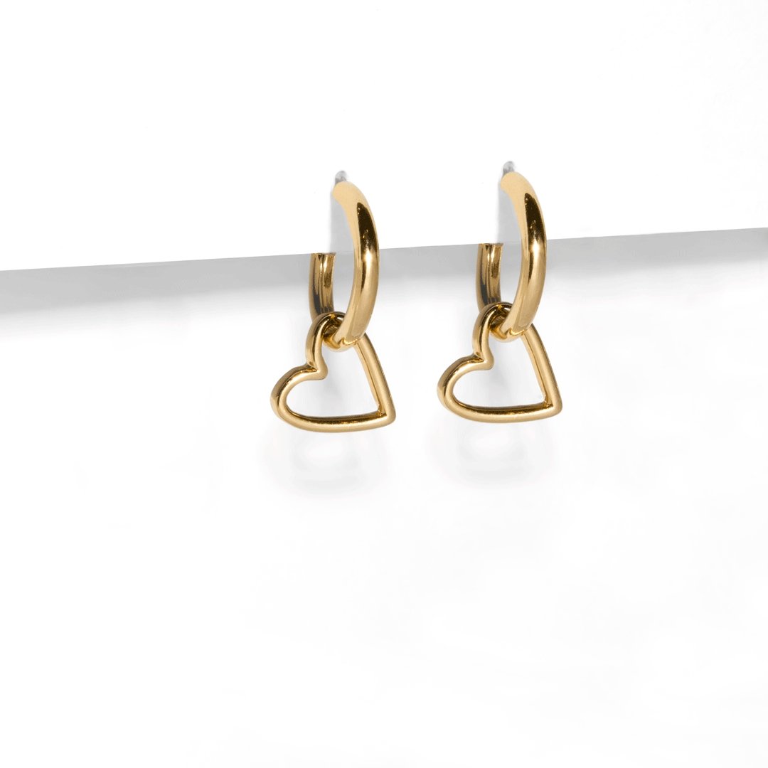 GOLDEN OUTLINE HEART HUGGIES - ARETES - Malandra Jewelry - TA1093