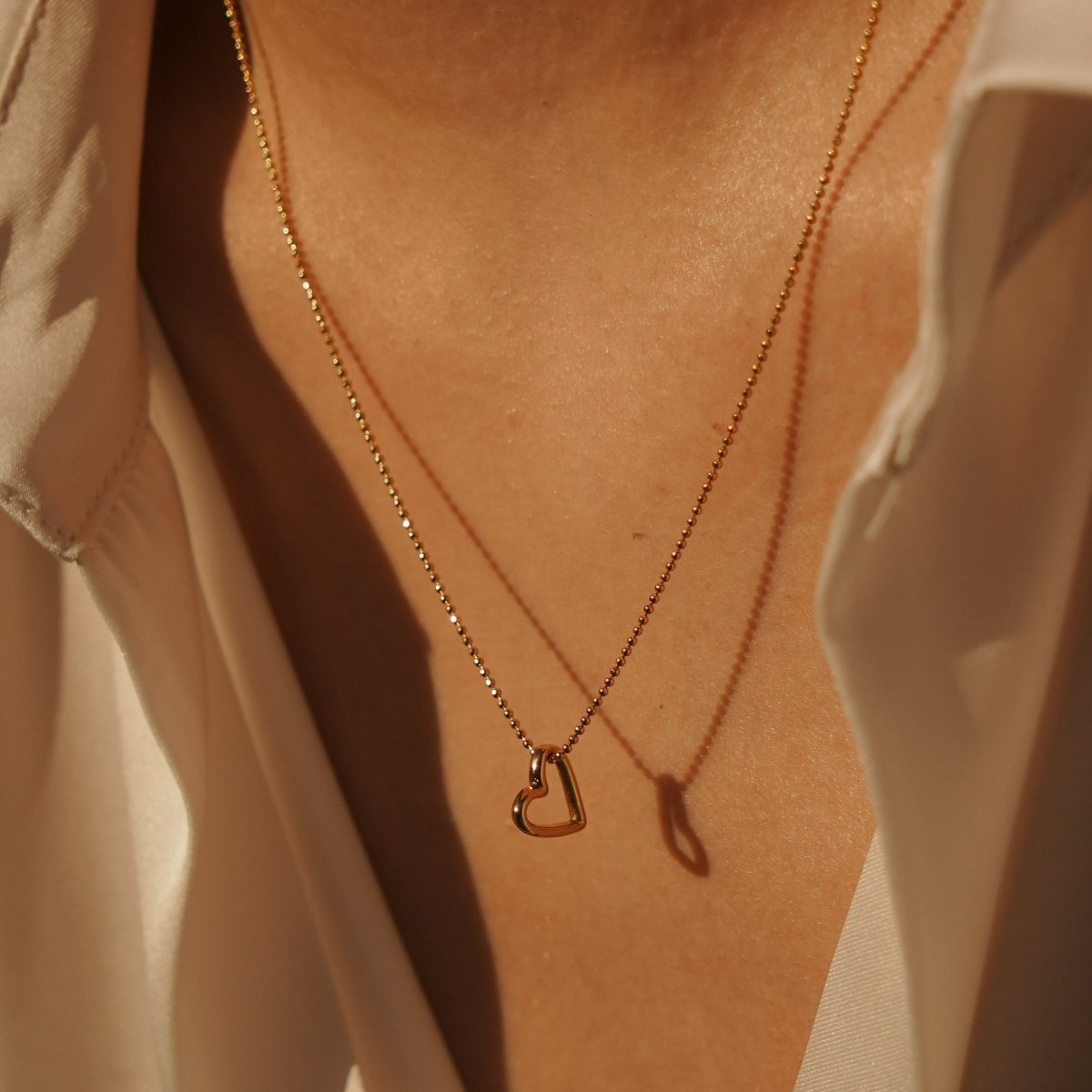 OUTLINED HEART GOLDEN NECKLACE - COLLARES - Malandra Jewelry - TC1044