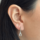 SHIMMERING BONE SILVER HUGGIES - ARETES - Malandra Jewelry - AA1440.P-G66839