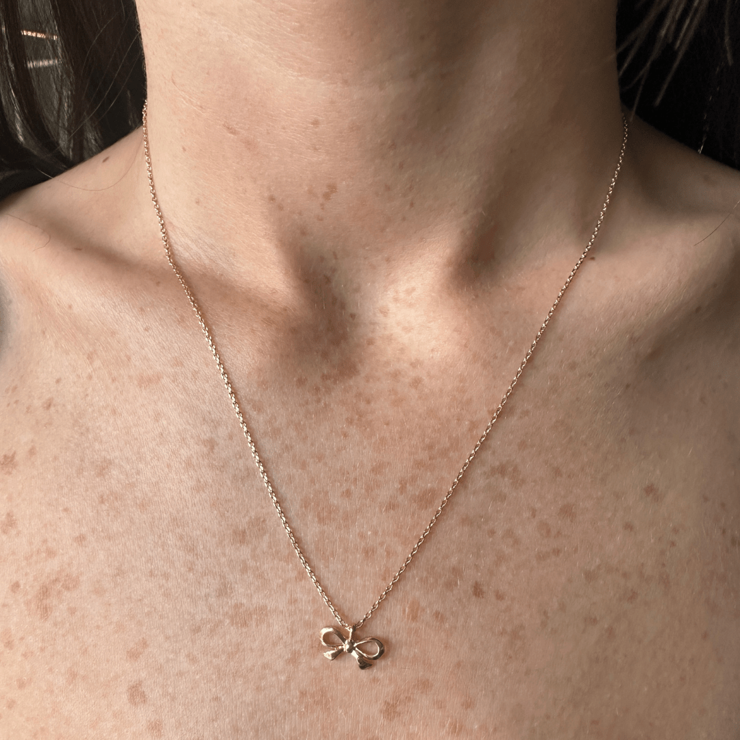 TINY BOW GOLDEN NECKLACE - COLLARES - Malandra Jewelry - XSC98 - SB - 210011GD
