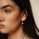 MOTHER OF PEARL DROP HUGGIES - ARETES - Malandra Jewelry - AA1132