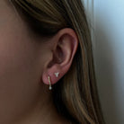 TWIST GOLD & DIAMOND HUGGIE - ARETES - Malandra Jewelry - SNA16